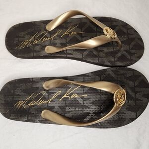 Michael Kors Black and Gold Flip Flops